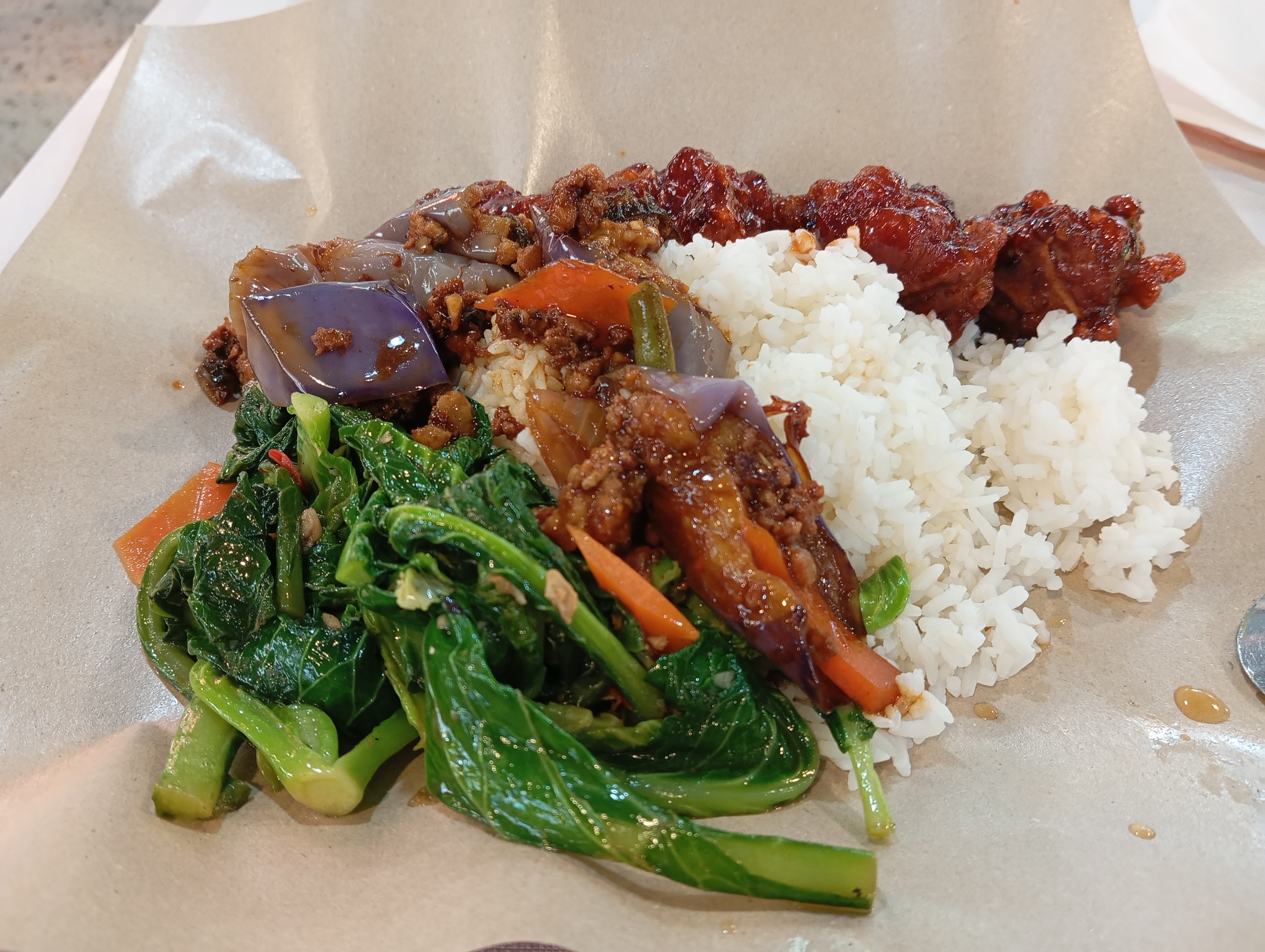 Mixed Economic Rice is probably the most predictable, simple, comfort food in most of Singapore's foodcourts and coffeeshops.