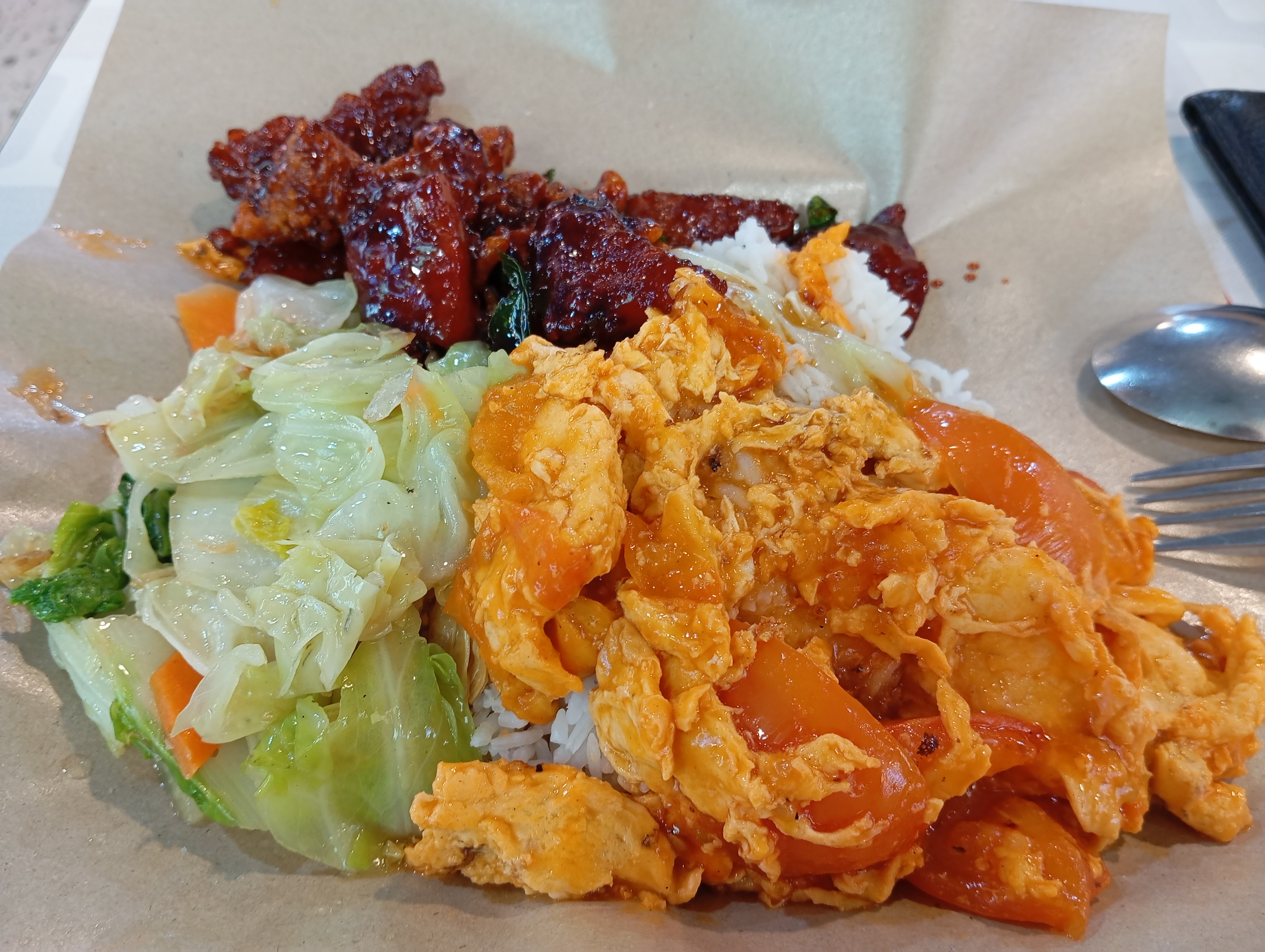 The young man working the cai png (mixed veg rice) stall noticed me and recognized that I have been using my SG60 vouchers to pay for my meals, and he decided to give me more ingredients today.